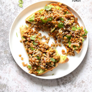 Ginger Coriander Sprouted Lentil Avocado Toast. Sprout Lentils of Mung Beans, Lightly saute with ginger, onion and tomato and serve over Mashed Avocado Toast. #Vegan #veganricha #Nutfree #Soyfree #Recipe | VeganRicha.com
