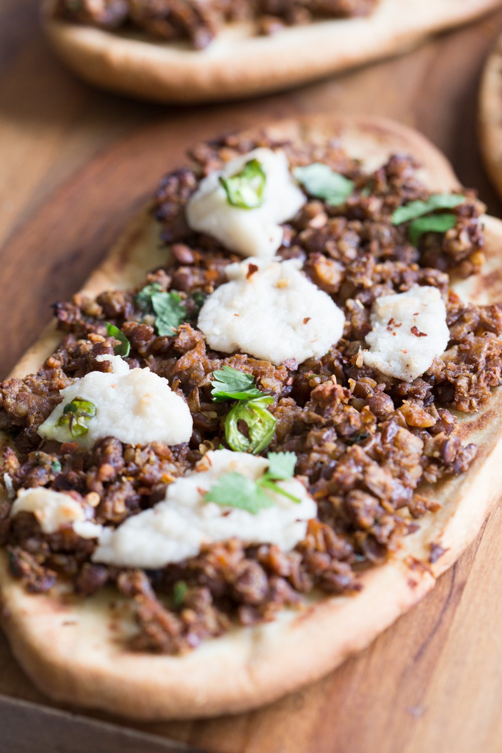 Vegan Keema Naan with Keema Lentils, onion, carrots and walnuts. These lentils with the herbs and spices make a vegan version of keema. Serve over Naan bread or Pizza or fill tacos or wraps. #Vegan #Recipe #veganricha, Can be gluten-free and soy free.  | VeganRicha,com