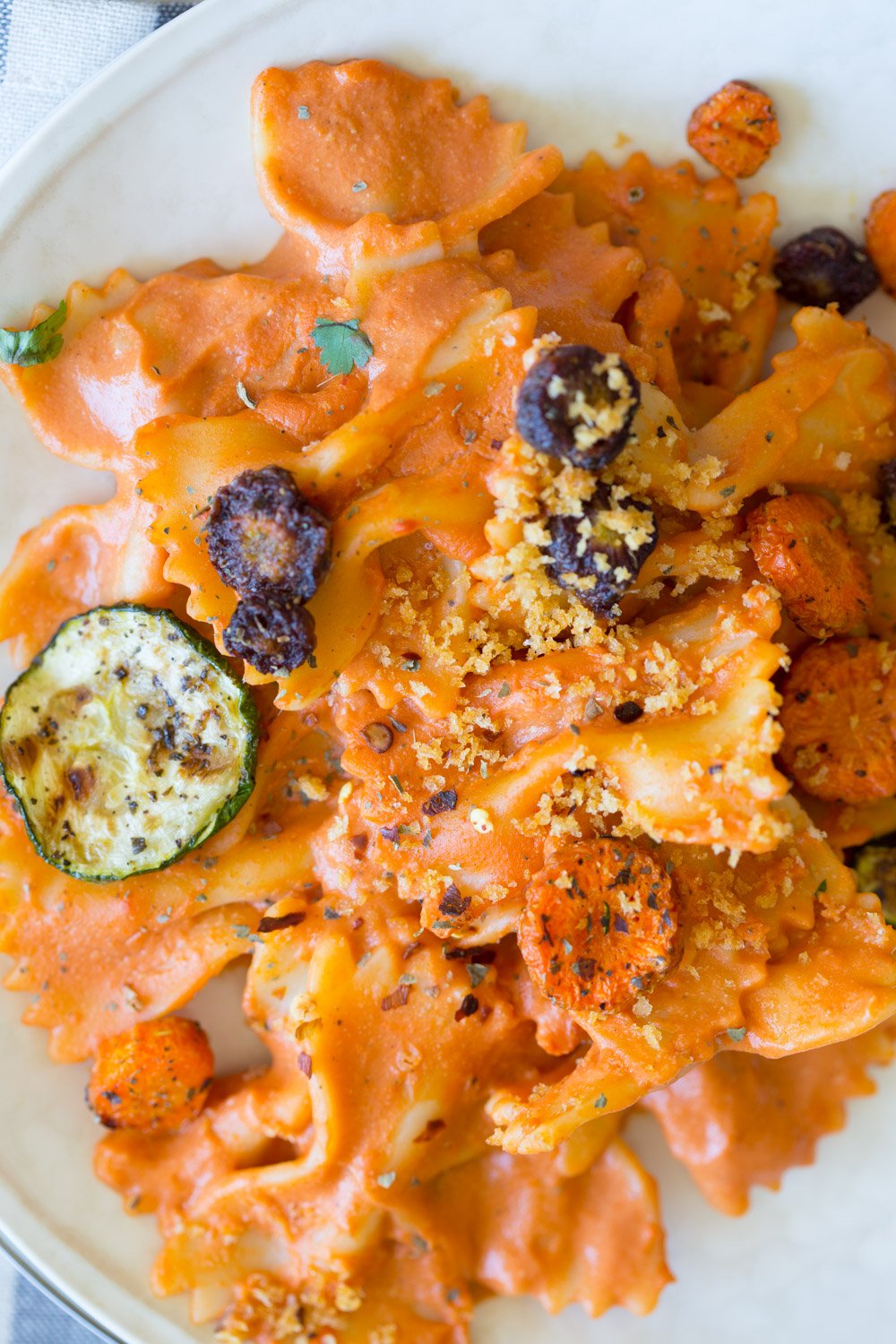 Vegan Rose Sauce Farfalle Pasta with Roasted Veggies. Easy Vegan Rose Sauce, serve with farfalle or other pasta, roasted veggies and vegan parm. #Vegan #veganricha #Soyfree #Recipe. Can be #glutenfree | VeganRicha.com