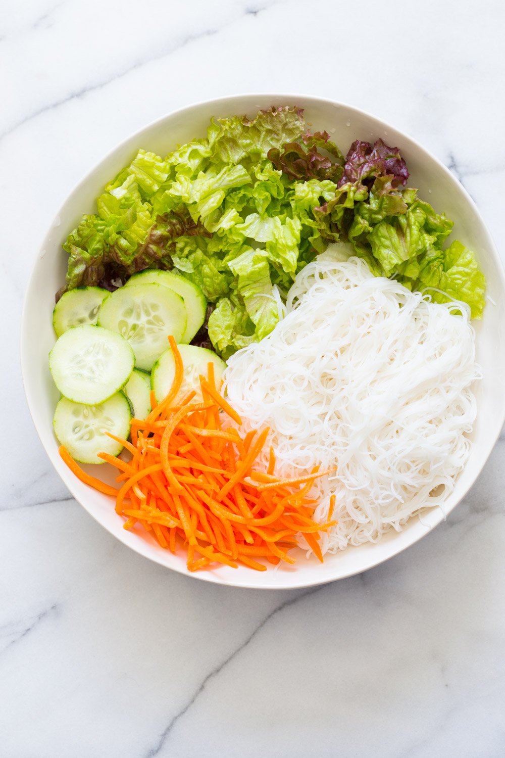 Crunchy Veggie Vegan Summer Rolls Deconstructed into a Bowl. Served with Peanut Butter Dipping Sauce. Fresh Spring Rolls/ Rice paper rolls in a bowl. Make a bowl, wrap or fill up rice paper wrappers. #Vegan #Glutenfree #Recipe #veganricha Use Sunbutter to make #nutfree | VeganRicha.com