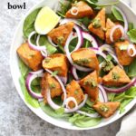 Tempeh Tandoori Tikka Bowl with Cilantro Mint Chutney. Tempeh marinated in Delicious and Flavorful Tandoori Marinade, then baked and served over greens, onions. #veganricha #Vegan #Glutenfree #Recipe. Use vegan meat subs for #soyfree | VeganRicha.com