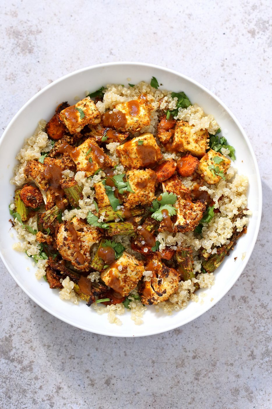 Tofu and Veggie BBQ Bowl. Veggies and Tofu tossed in from scratch barbecue seasoning and baked. Serve over quinoa dressed with bbq sauce. #Vegan #Glutenfree #Nutfree #Recipe #veganricha