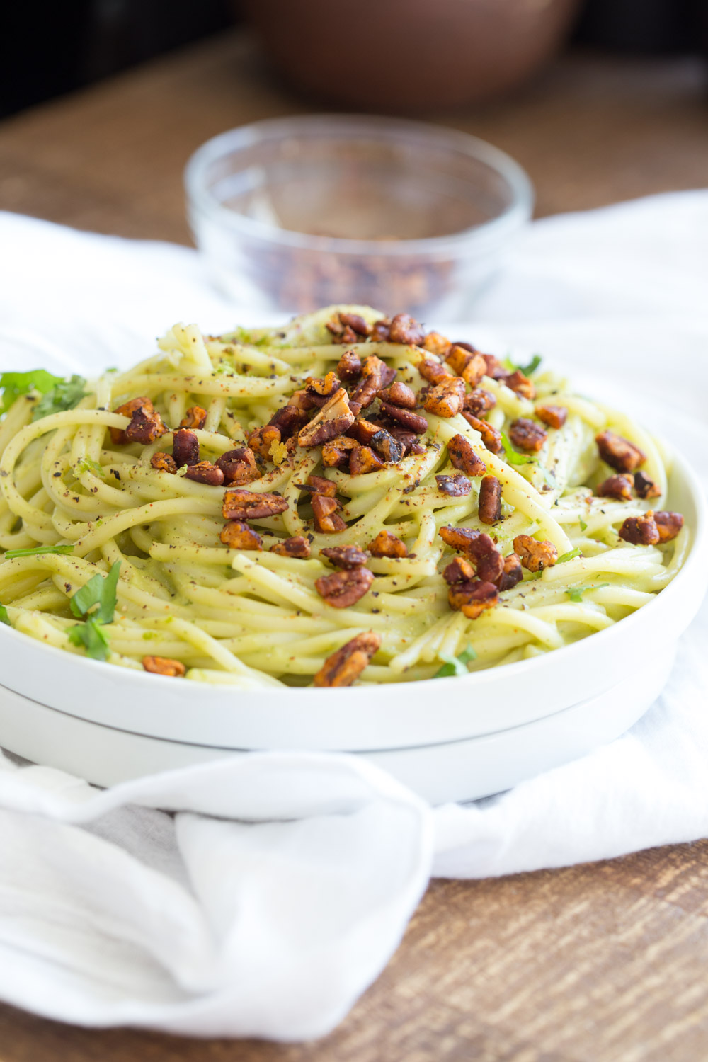 Avocado Pasta with Smoky Pecans. This 20 Minute Creamy Avocado Basil Sauce is great over spaghetti or zoodles. Serve with smoky spicy pecans for amazing flavor.  #Vegan #Soyfree #Recipe. Can be #nutfree. #veganricha | VeganRicha.com