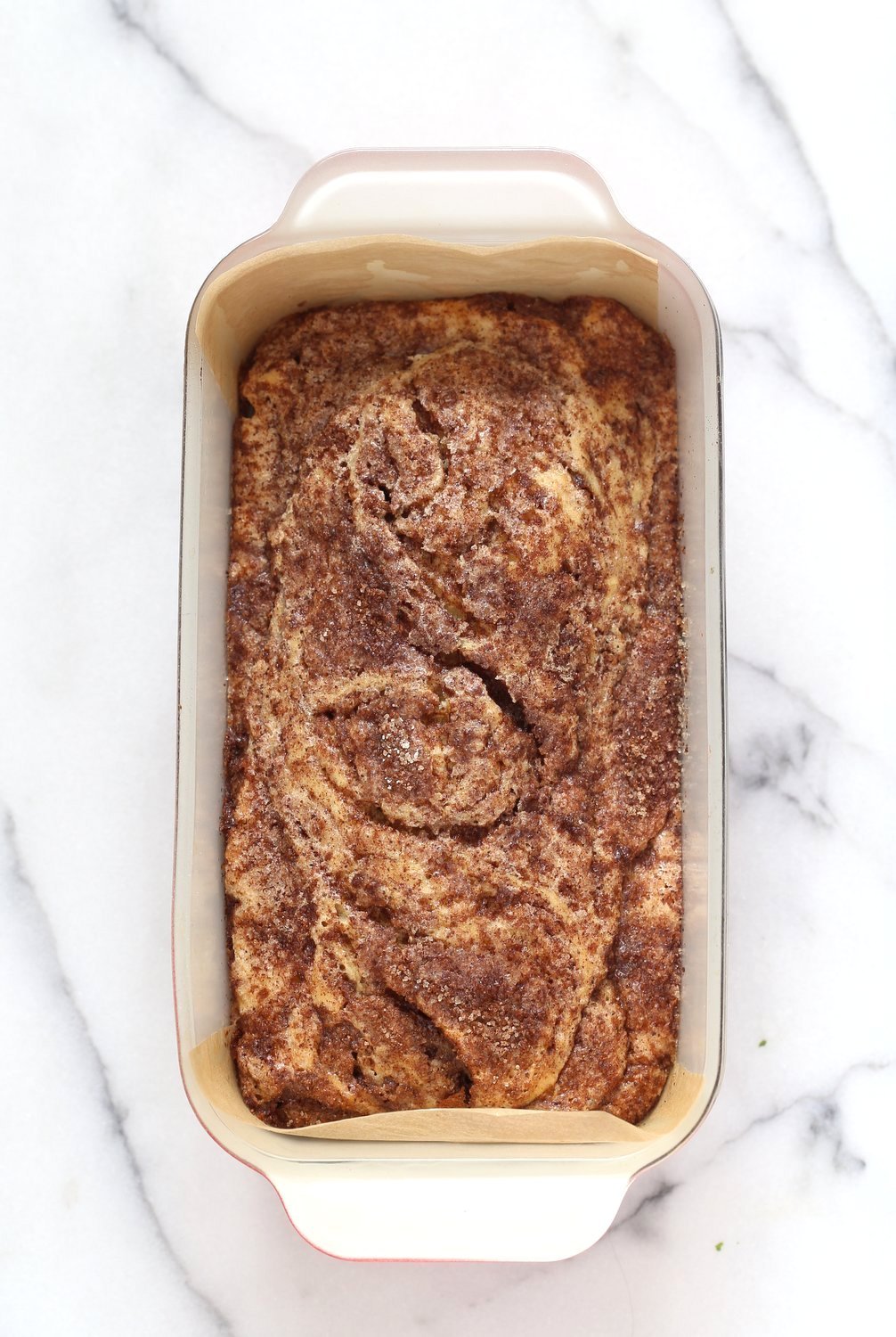 This Vegan Cinnamon Swirl Cake is super Easy and Quick. A simple yellow cake, swirled with cinnamon sugar makes for a delightful treat. Add some nuts into the swirl for variation #Vegan #Nutfree #Soyfree #Dessert #Recipe #veganricha | VeganRicha.com