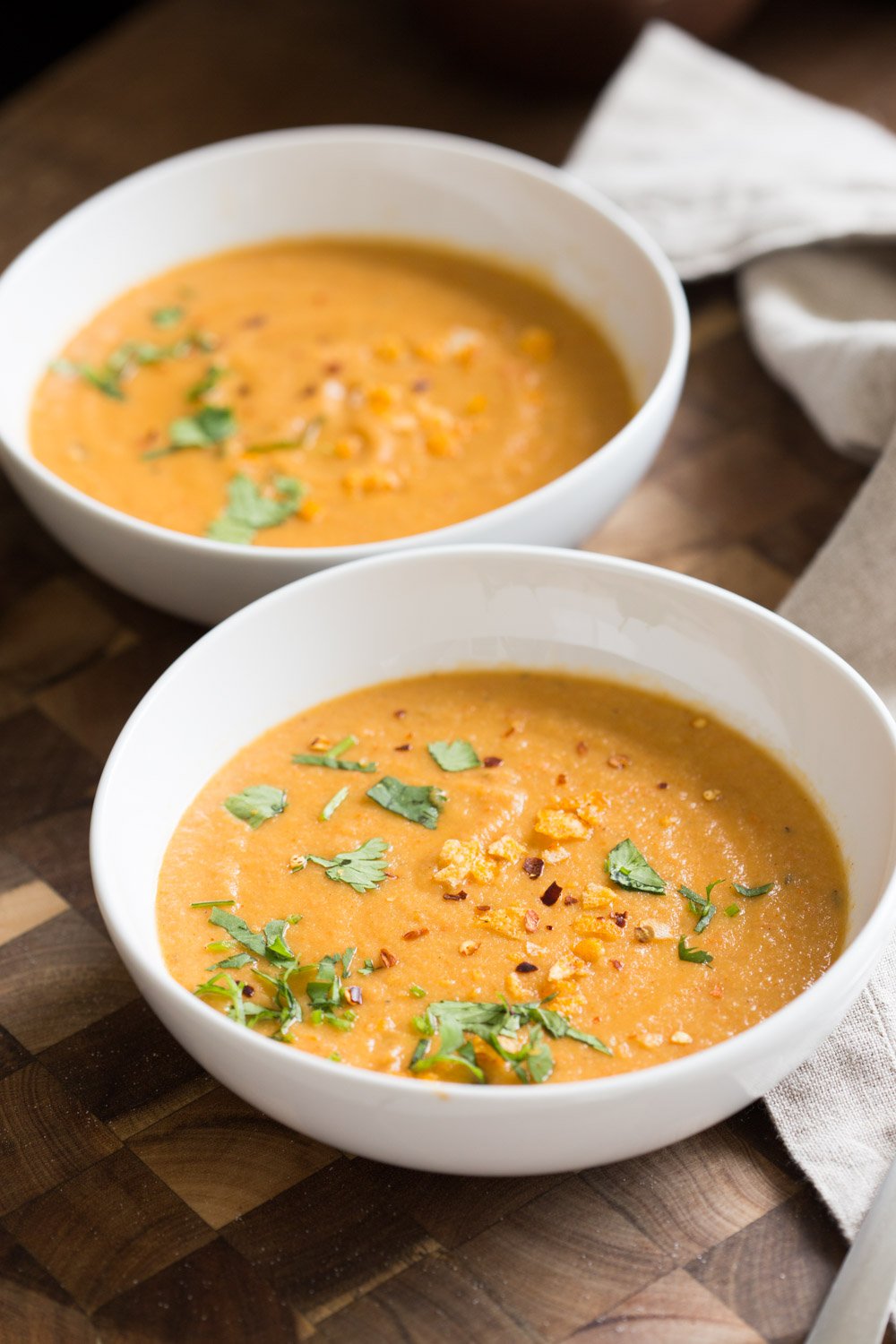 Our Vegan Instant Pot Cauliflower Soup in white bowls