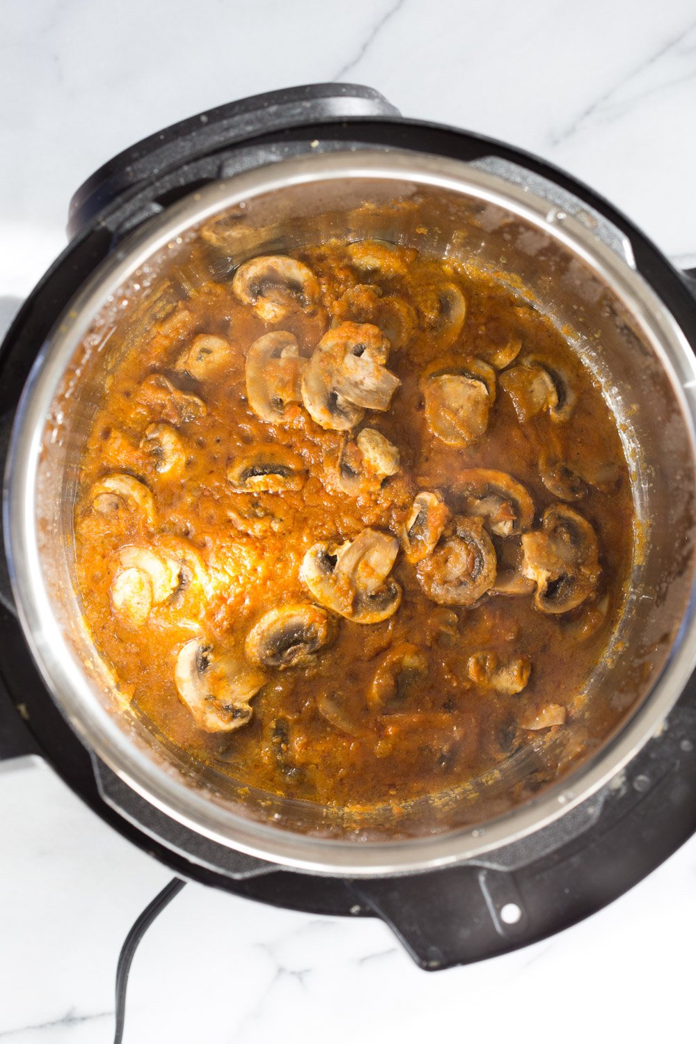 Instant Pot Mushroom Masala. Easy Mushrooms and peas in Creamy Sauce made in an Instant Pot. Add chickpeas for a hearty meal. #Vegan #Gluten-free #Soyfree #Recipe. Can be #nutfree  #VeganRicha