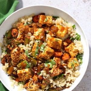 Tofu and Veggie BBQ Bowl. Veggies and Tofu tossed in from scratch barbecue seasoning and baked. Serve over quinoa dressed with bbq sauce. #Vegan #Glutenfree #Nutfree #Recipe #veganricha