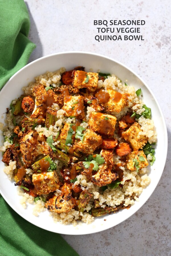 Tofu and Veggie BBQ Bowl. Veggies and Tofu tossed in from scratch barbecue seasoning and baked. Serve over quinoa dressed with bbq sauce. #Vegan #Glutenfree #Nutfree #Recipe #veganricha