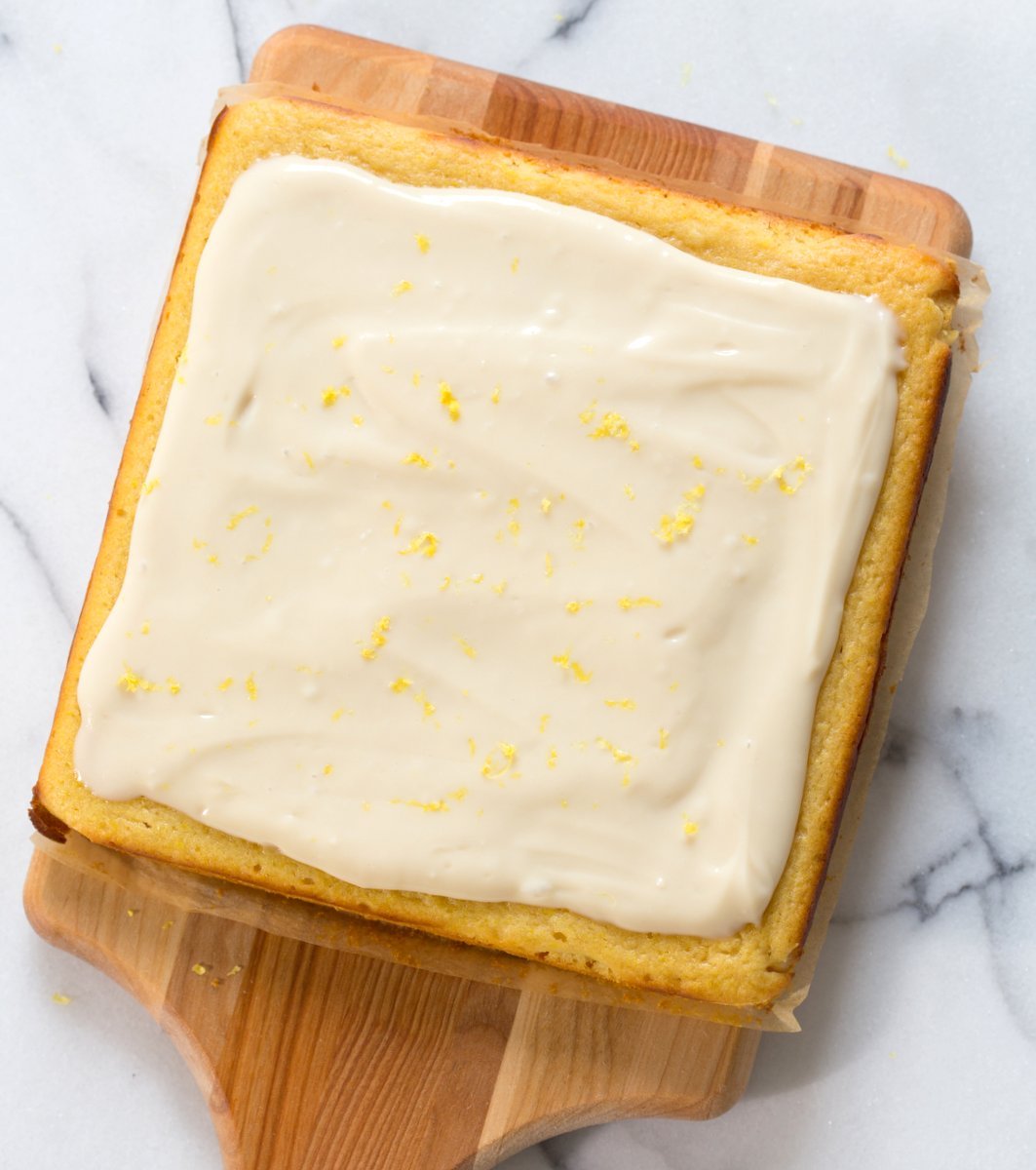 Vegan Lemon Cake with Cream Cheese Frosting. No added refined sugar in this soft and Delicious Lemon Cake! Make into cupcakes, loaf or a sheet pan cake. #Vegan #Soyfree #Recipe #lemoncake Can be nut-free #veganricha | VeganRicha.com