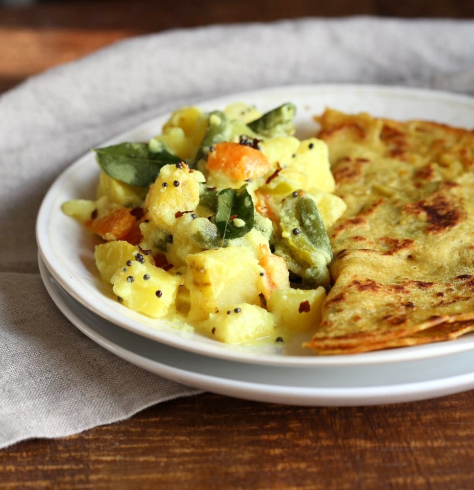 Avial - South Indian Veggie Coconut Curry. Seasonal Vegetables in easy spiced coconut sauce. Serve over rice, flatbread or dosa crepes. #Vegan #Indian #Glutenfree #Soyfree #Recipe #VEGANRICHA
