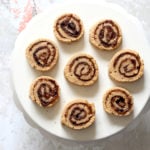 Vegan Cinnamon Roll Cookies. Soft shortbread like cookie dough dusted with cinnamon sugar, rolled, sliced and baked for cinnamon roll bites. #Vegan #Soyfree #VeganRicha #Recipe. 