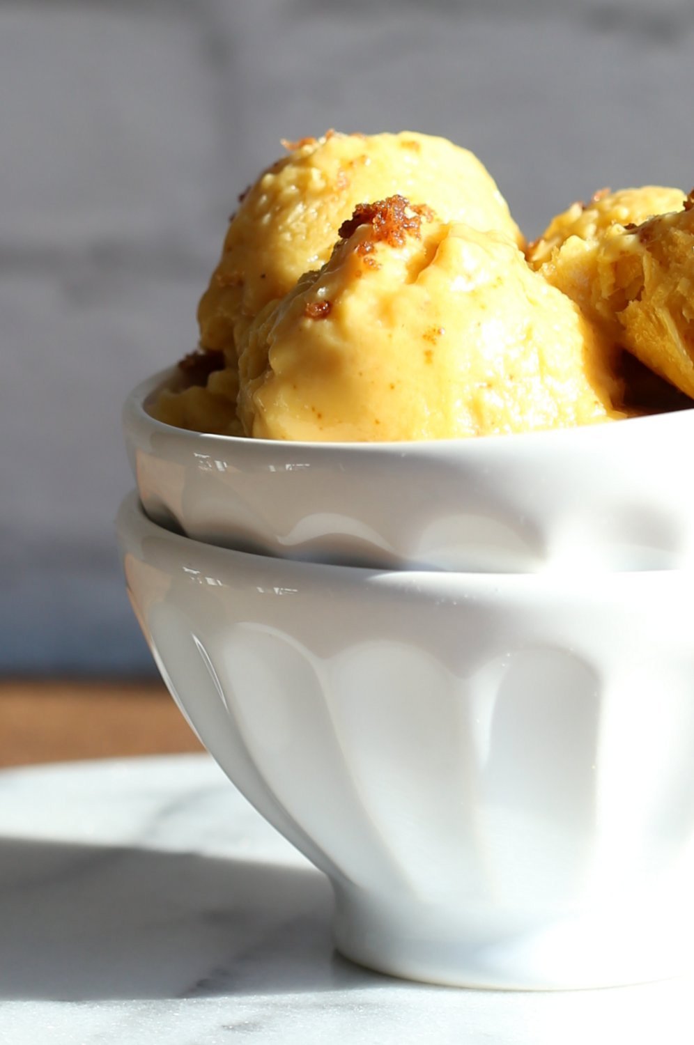 Easy Vegan Mango Ice Cream. This Creamy ice cream has vegan cream cheese, ripe mango and hint of vanilla. Delicious Mango Cheesecake Ice cream for Summer. #Vegan #Glutenfree #Soyfree #Recipe #veganricha