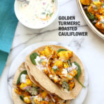 Turmeric Roasted Cauliflower with Raita Dip. These Delicious Golden Cauliflower Bites are easy and quick. Serve with a dash of lemon or with a Yogurt onion dip or Green Chutney. #Vegan #Soyfree #Nutfree #veganricha #Recipe. Can be #glutenfree