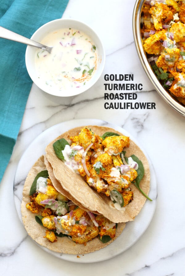 Turmeric Roasted Cauliflower with Raita Dip. These Delicious Golden Cauliflower Bites are easy and quick. Serve with a dash of lemon or with a Yogurt onion dip or Green Chutney. #Vegan #Soyfree #Nutfree #veganricha #Recipe. Can be #glutenfree