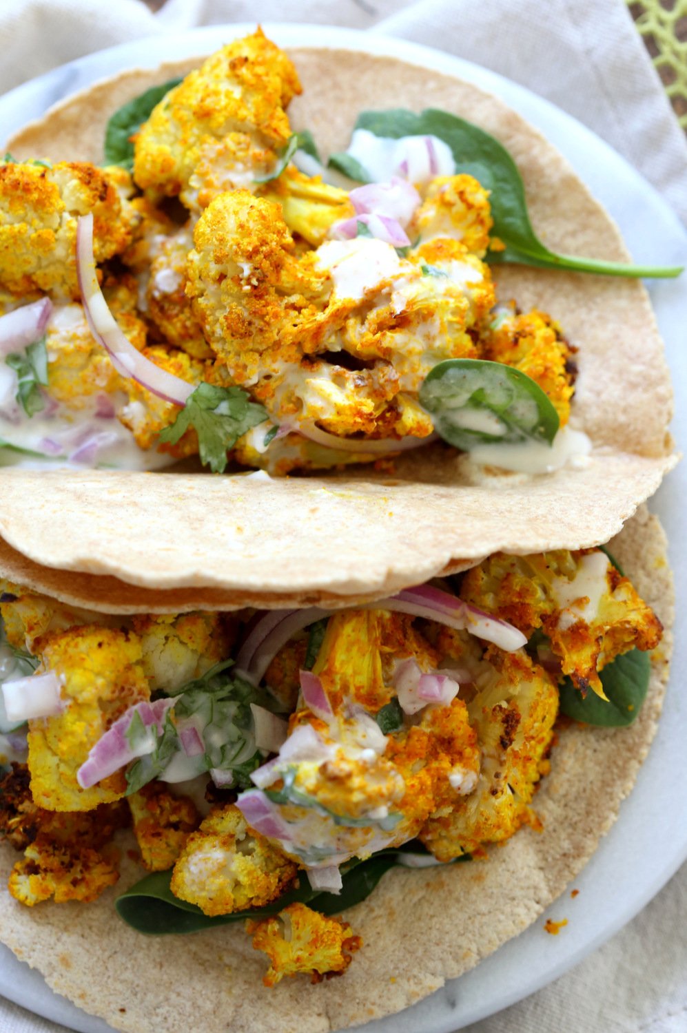 Turmeric Roasted Cauliflower Tacos on Marble