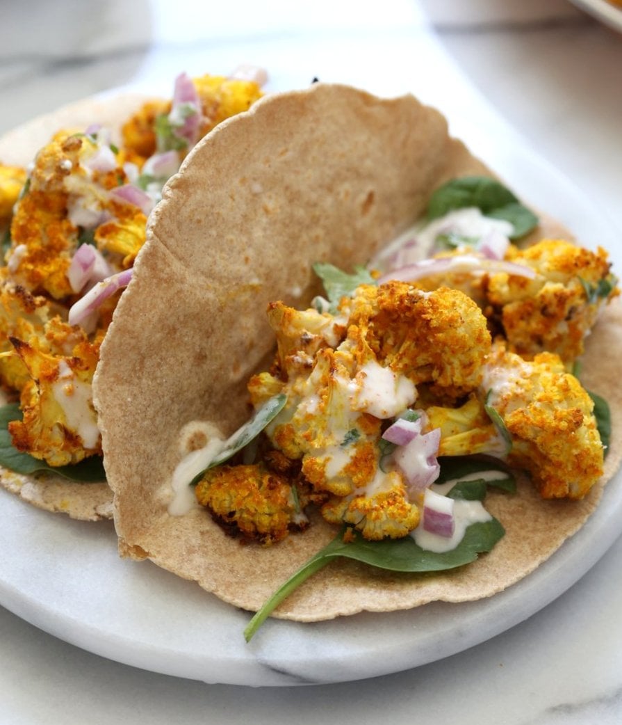 Turmeric Roasted Cauliflower with Raita Dip. These Delicious Golden Cauliflower Bites are easy and quick. Serve with a dash of lemon or with a Yogurt onion dip or Green Chutney. #Vegan #Soyfree #Nutfree #veganricha #Recipe. Can be #glutenfree