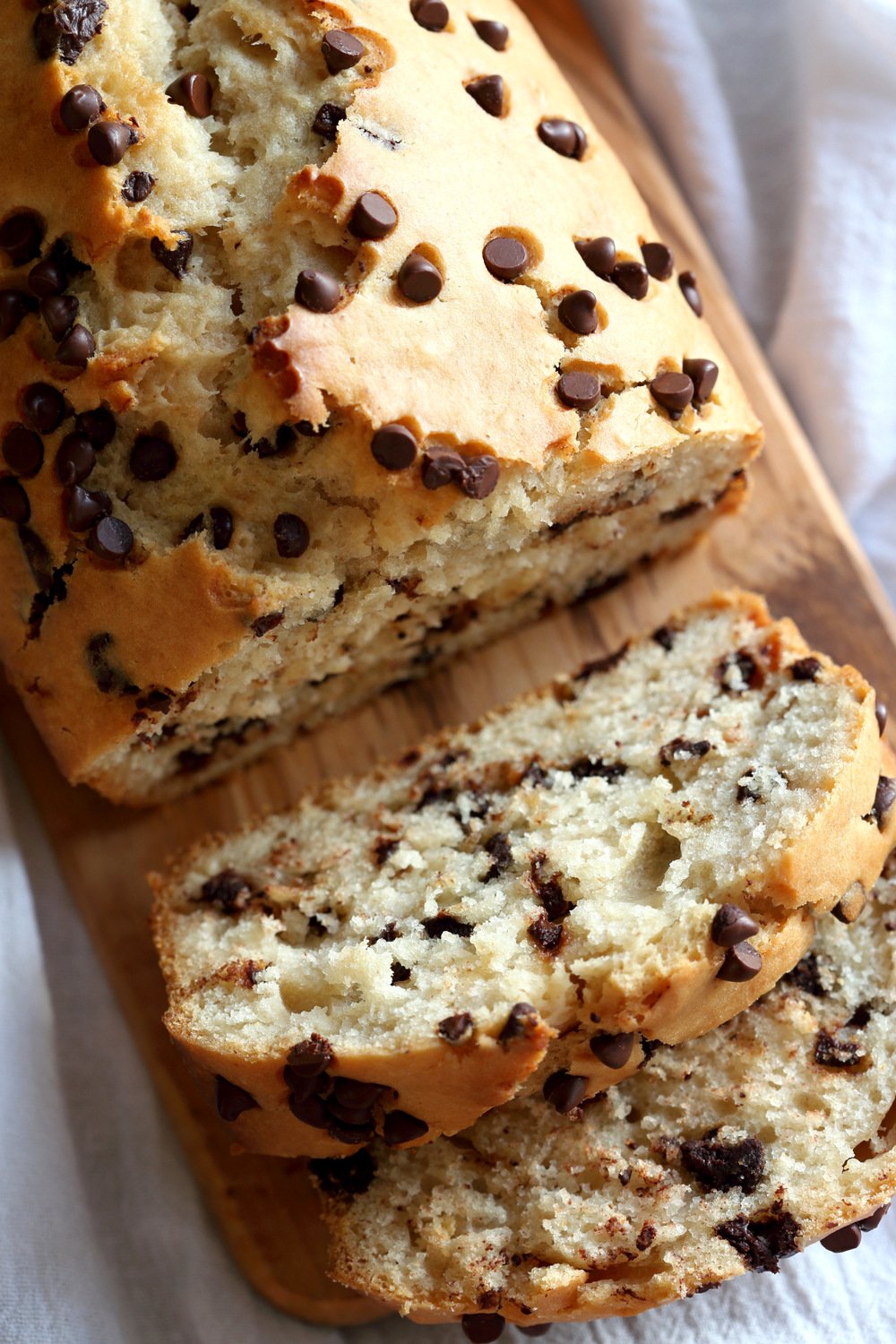 Top shot of Vegan Chocolate Chip Cake over wood board