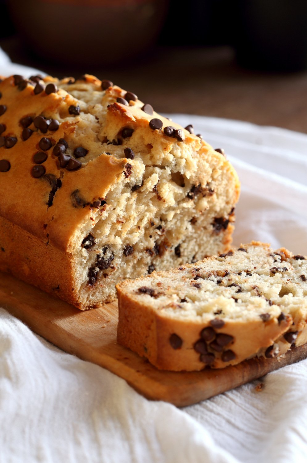 Vegan Chocolate Chip Cake on white napkin over wood Table