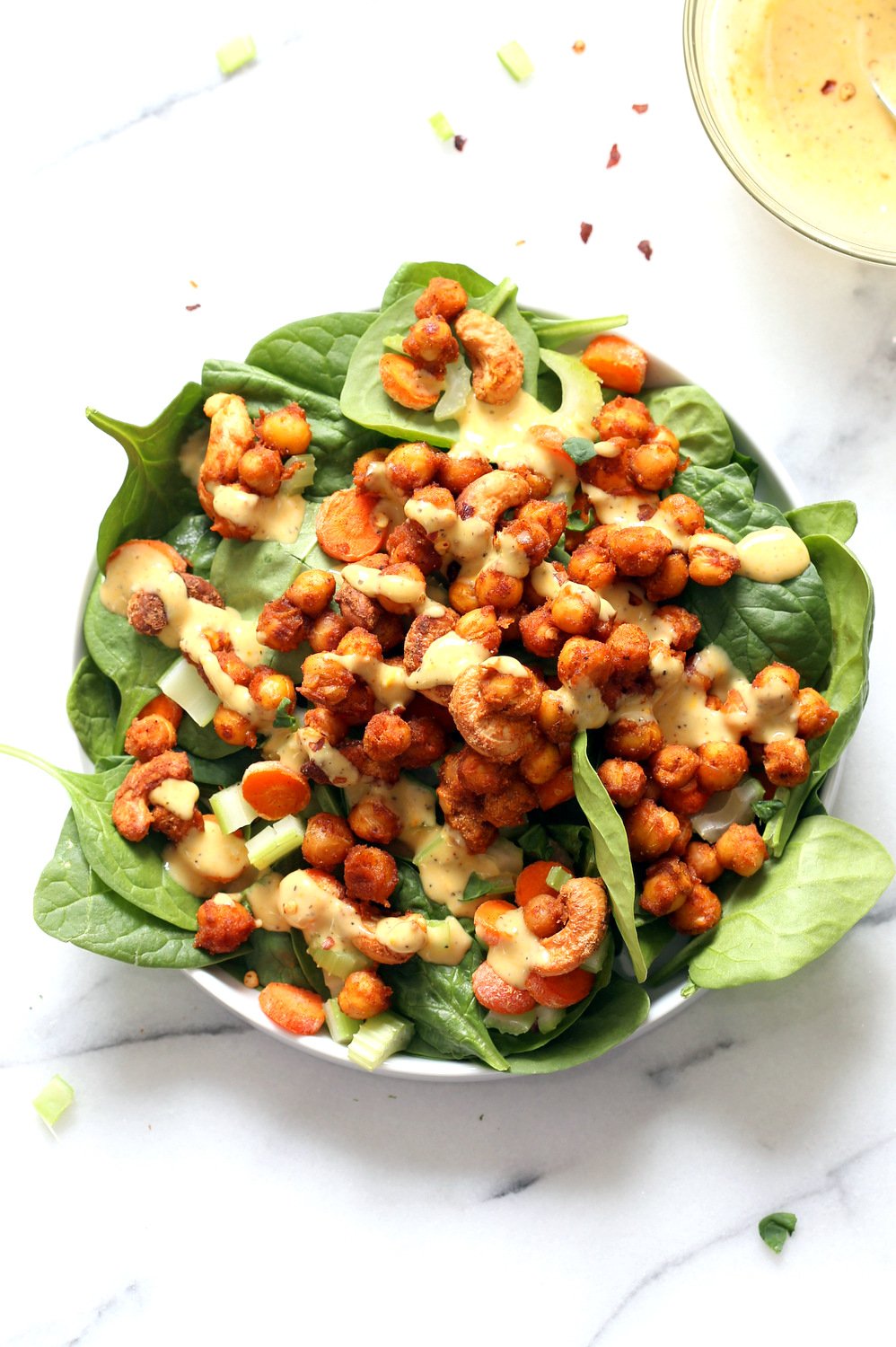 Sriracha Chickpeas, Cashews, Spinach Bowl with Ranch Curry Dressing. Add these Sriracha Roasted Chickpeas and Cashews to Bowls, wraps, salads. #Vegan #Glutenfree #Soyfree #Recipe Omit Cashews to make #nutfree #veganricha | VeganRicha.com