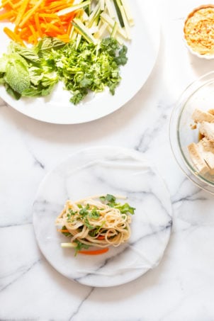 Assembly process of our vegan Fresh Spring rolls on marble