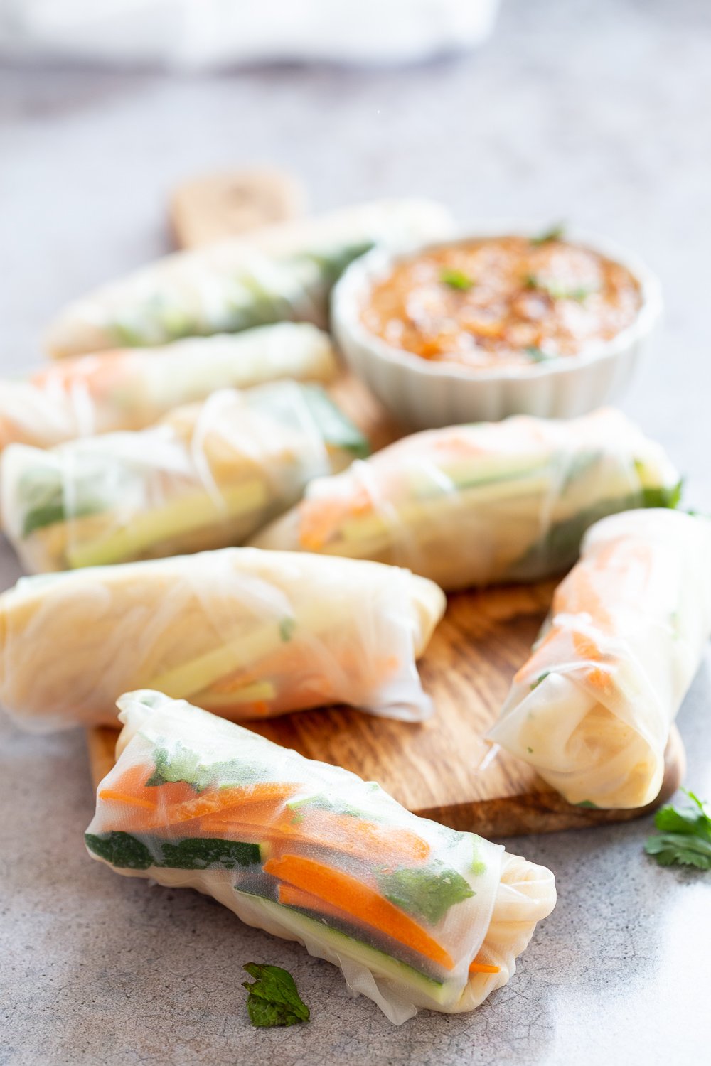 Easy Vegan Fresh Spring Rolls with Peanut Sauce. Rice paper Fresh Rolls with Marinated Tofu and Quick Peanut Dipping Sauce. #Vegan #VeganRicha #VeganSpringrolls #VeganSummerrolls Glutenfree #Recipe Can be Nutfree with Sunbutter or Sweet Chili sauce.