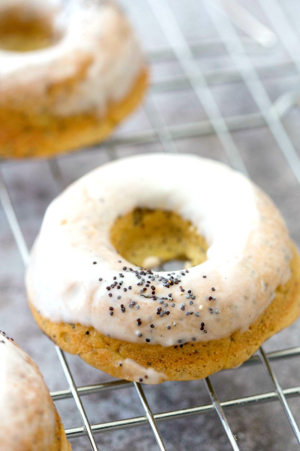 Lemon Poppy Seed Donuts - #Vegan Lemon Poppy Seed Donut Recipe. Simple to make and ready in less than 30 minutes. Top with cream cheese frosting. #VeganRicha #recipe #donuts