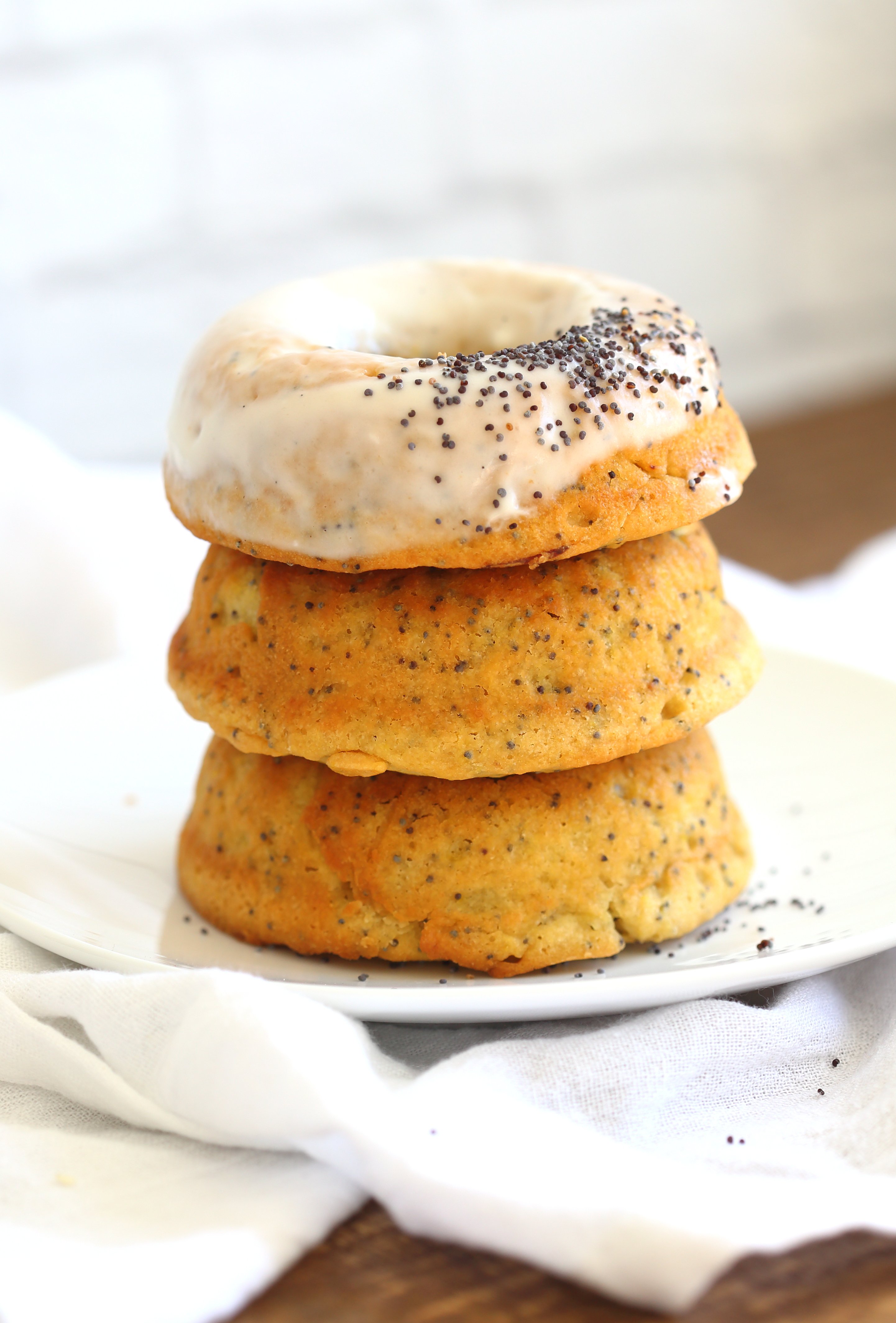 Lemon Poppy Seed Donuts - #Vegan Lemon Poppy Seed Donut Recipe. Simple to make and ready in less than 30 minutes. Top with cream cheese frosting. #VeganRicha #recipe #donuts #Nutfree #lemonpoppyseedonut