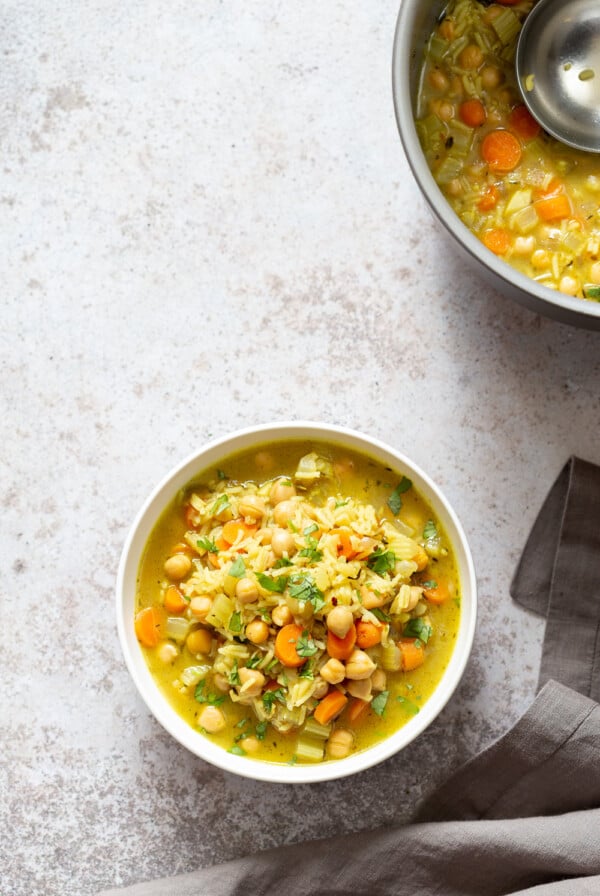 Comforting and Healing Vegan Chickpea Rice Soup with Veggies. A glutenfree variation of Vegan Chicken Noodle Soup. Easy 1 Pot 30 minute meal. #vegan #veganricha #Glutenfree #Nutfree #Recipe #Soyfreeoption