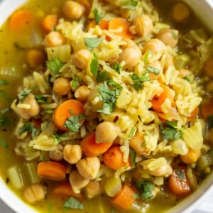 Comforting and Healing Vegan Chickpea Rice Soup with Veggies. A glutenfree variation of Vegan Chicken Noodle Soup. Easy 1 Pot 30 minute meal. #vegan #veganricha #Glutenfree #Nutfree #Recipe #Soyfreeoption