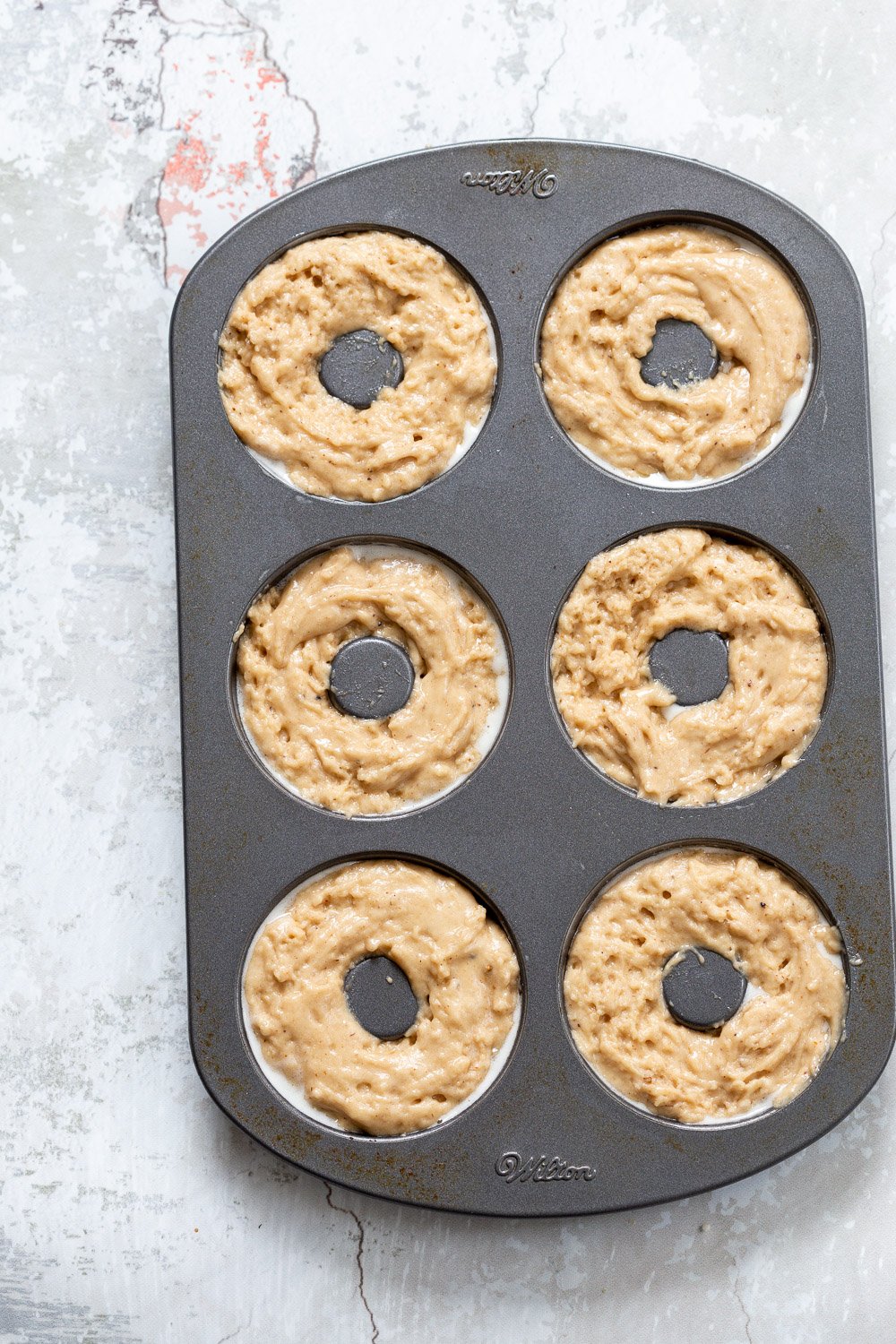 Baked Apple Cider Donuts. These Cider donuts have amazing spiced flavor with concentrated cider. Perfect for fall. #Vegan #Soyfree #Recipe.