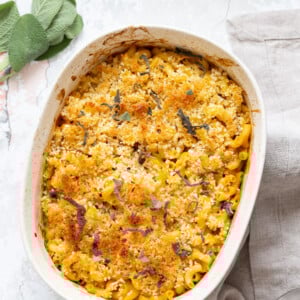Vegan Pumpkin Mac and Cheese Bake. Easy Creamy Pumpkin Sauce with pasta, topped with crisp sage and breadcrumbs. #Vegan #Soyfree #Recipe #VeganRicha #nutfree option