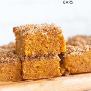  These Vegan Gluten-free Pumpkin Bars are grain-free, fudgy and so Delicious! Cinnamon streusel on top makes them decadent and festive. #Vegan #Glutenfree #Soyfree #Paleo #Grainfree #Recipe #VeganRicha
