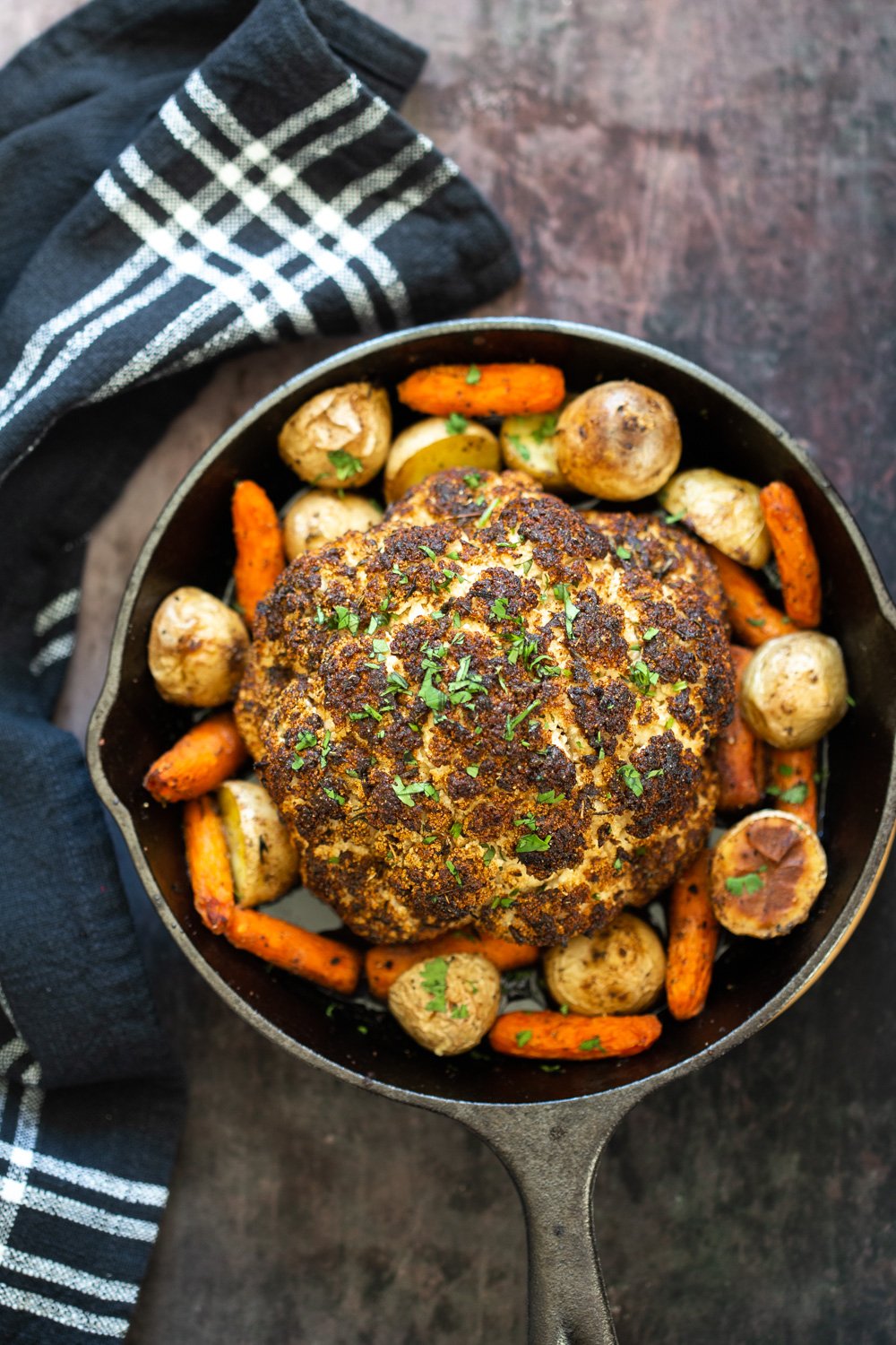 Whole Roasted Cauliflower. This Baked Whole Roasted Cauliflower is marinated in flavorful of herbs and spices and baked to perfection to make a fabulous Holiday table option. #VeganRicha #holiday #Vegan #Glutenfree #Nutfree #recipe. Can be #soyfree