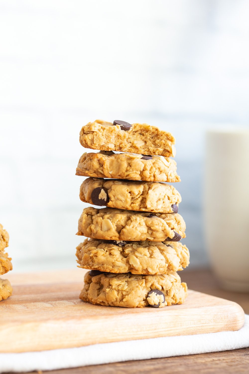 These Vegan Peanut Butter Oatmeal Chocolate Chip Cookies are melt in your mouth, delicious and hearty cookies. They need 1 Bowl, just 8 Ingredients and are ready within 30 Minutes. #Vegan #Soyfree #Recipe #Glutenfreeoption #refinedsugarfree #refinedoilfree #VeganRicha #peanutbutteroatmealchocolatechipcookie #veganpeanutbutteratmealcookie