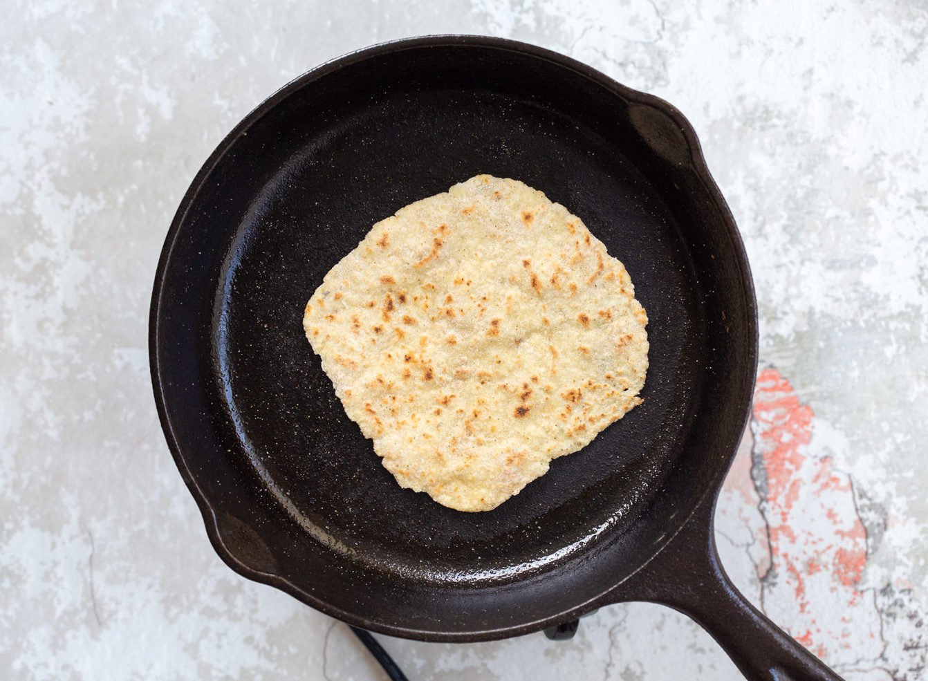 Gluten-free Cauliflower flatbread. This Gluten free flatbread is also #grainfree, #nutfree and #soyfree. It is soft and great for tacos and wraps. Add herbs of choice. #VeganRicha #glutenfree #Vegan #Recipe
