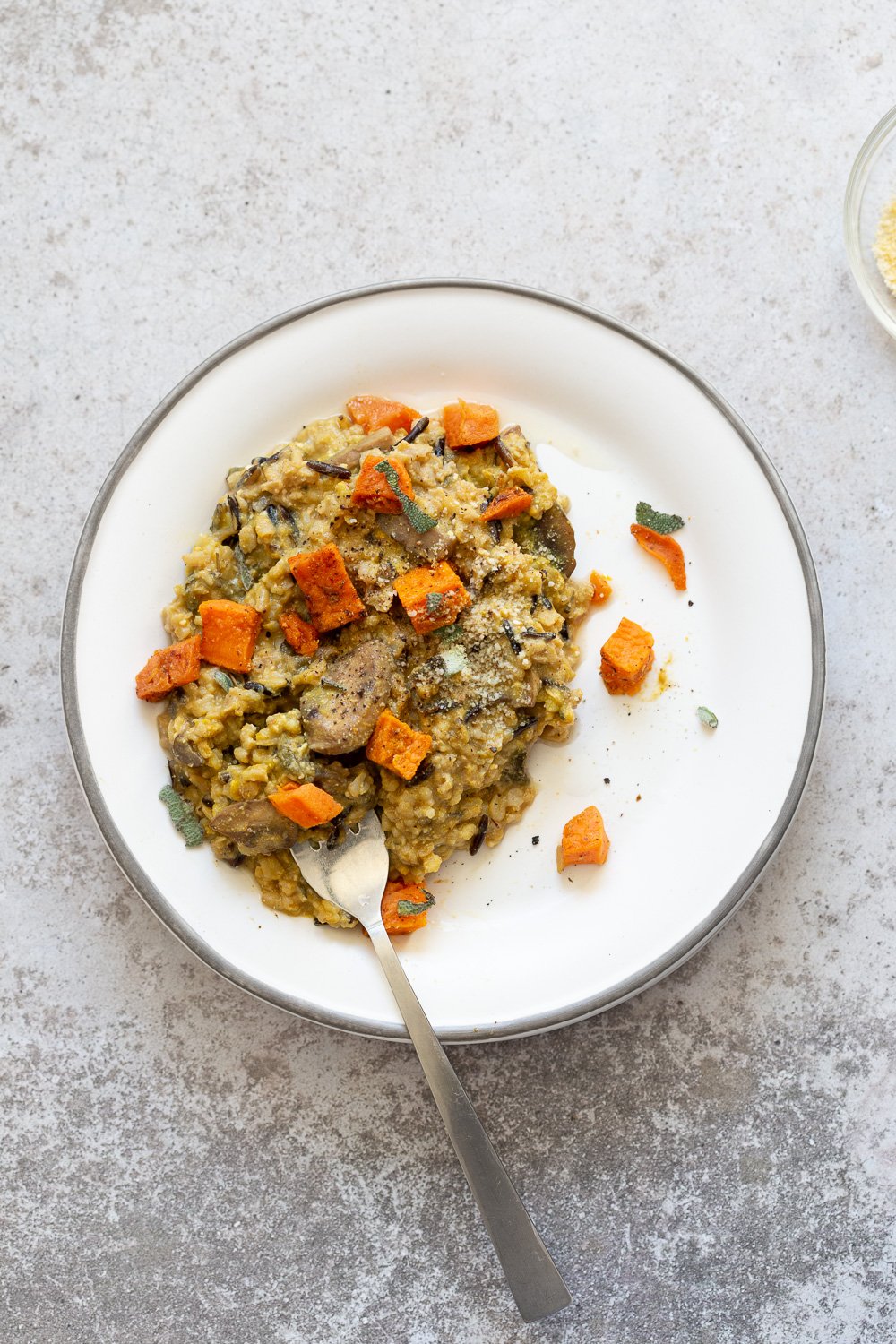 Vegan Pumpkin Risotto on a white plate #VeganRicha