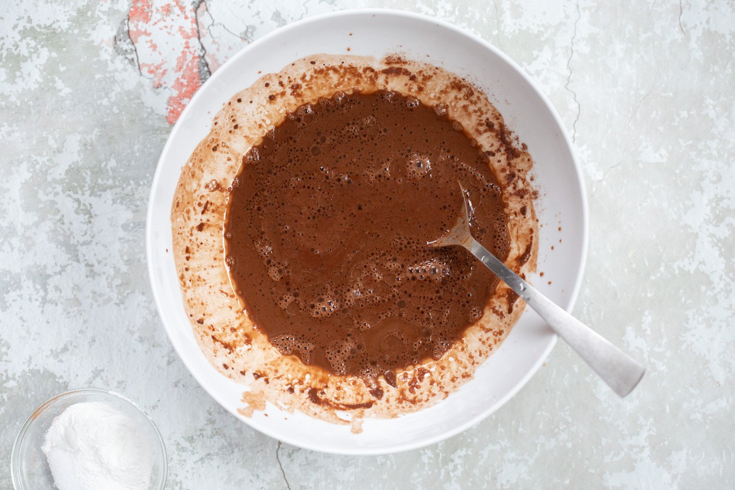 Vegan Chocolate Gingerbread Cake mixing process in white bowl