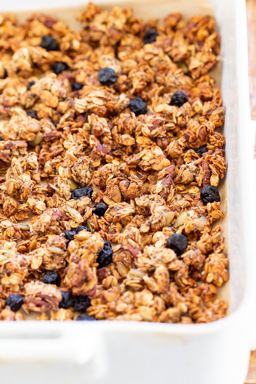 This Date Caramel Maple Pecan Granola is lightly sweet and perfect for any time. Pecans, Oats, coconut, pumpkin and chia seeds and dried blueberries tossed in date caramel and baked to perfection. #Vegan #Granola #Glutenfree #Soyfree #Recipe #VeganRicha Can be nutfree.