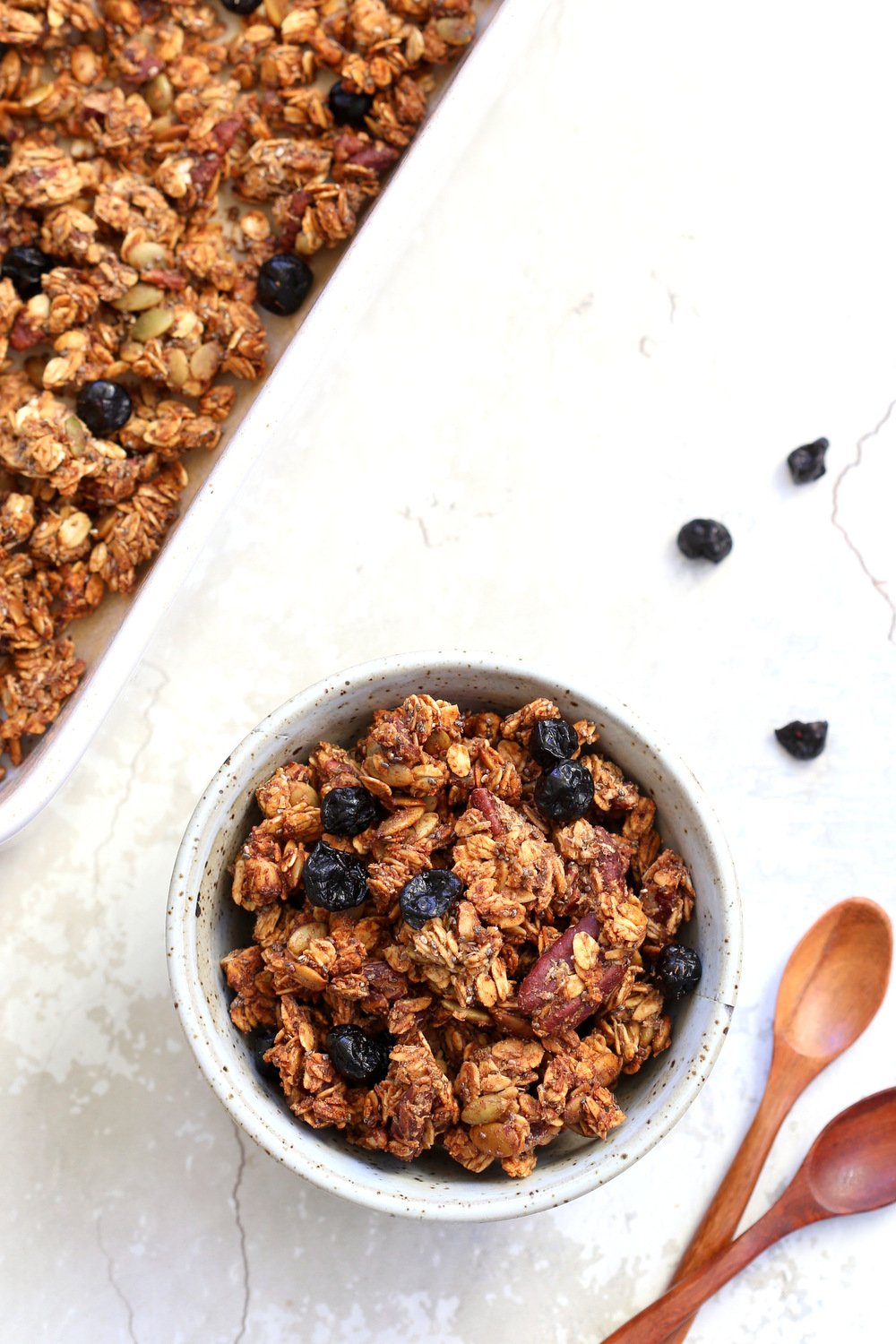 This Date Caramel Maple Pecan Granola is lightly sweet and perfect for any time. Pecans, Oats, coconut, pumpkin and chia seeds and dried blueberries tossed in date caramel and baked to perfection. #Vegan #Granola #Glutenfree #Soyfree #Recipe #VeganRicha Can be nutfree.