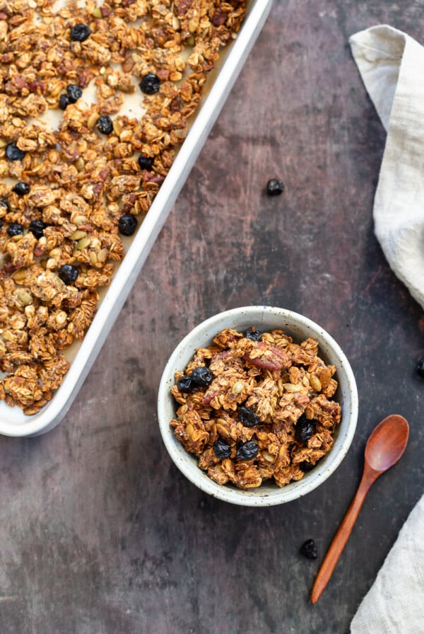 This Date Caramel Maple Pecan Granola is lightly sweet and perfect for any time. Pecans, Oats, coconut, pumpkin and chia seeds and dried blueberries tossed in date caramel and baked to perfection. #Vegan #Granola #Glutenfree #Soyfree #Recipe #VeganRicha Can be nutfree.