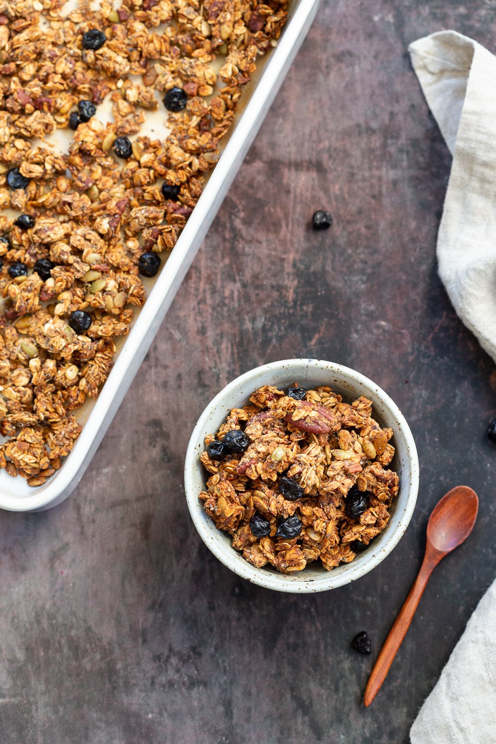 This Date Caramel Maple Pecan Granola is lightly sweet and perfect for any time. Pecans, Oats, coconut, pumpkin and chia seeds and dried blueberries tossed in date caramel and baked to perfection. #Vegan #Granola #Glutenfree #Soyfree #Recipe #VeganRicha Can be nutfree.