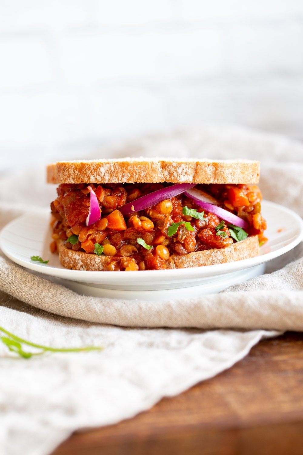 Instant Pot Vegan Lentil Sloppy Joes! 1 Pot, 30 min, freezer friendly tangy flavorful sloppy lentils. Serve in sandwiches with slaw or over tater tots or baked potato. #Vegan #Vegansloppyjoes #lentilsloppyjoes #Glutenfree #oilfree #Soyfree #Nutfree #Recipe #VeganRicha VeganRicha.com