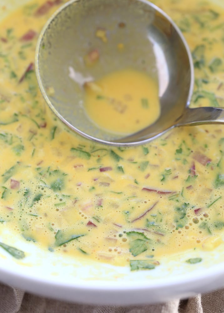 Vegan Chickpea Pancakes batter in a white bowl