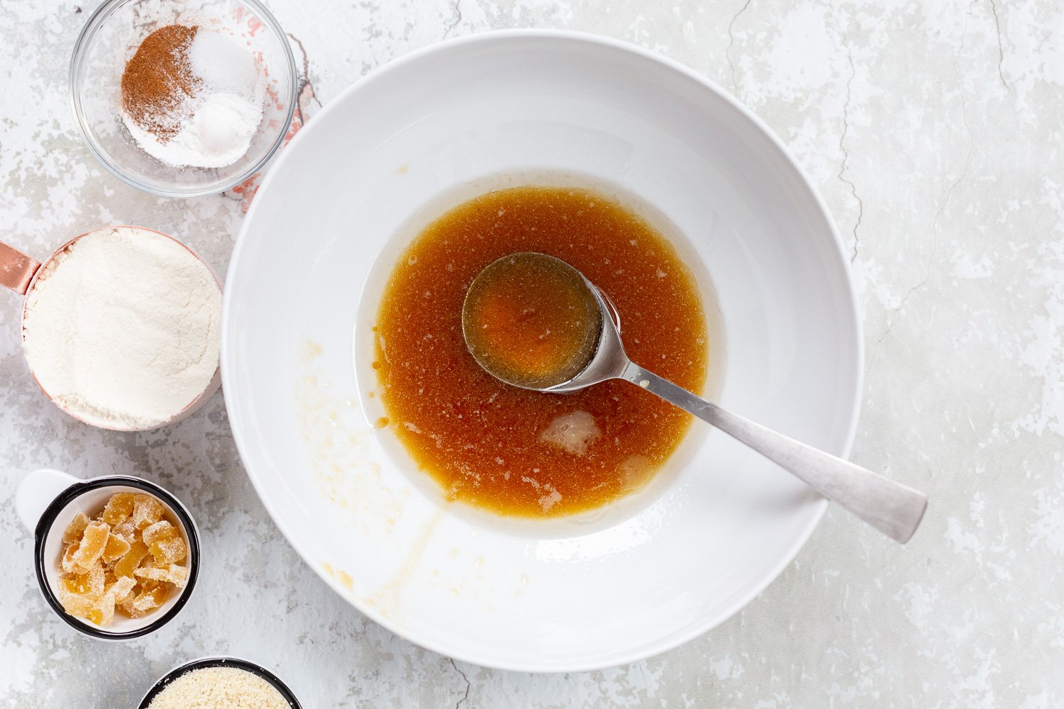 Vegan Snickerdoodle Bars process with wet ingredients in a large white bowl