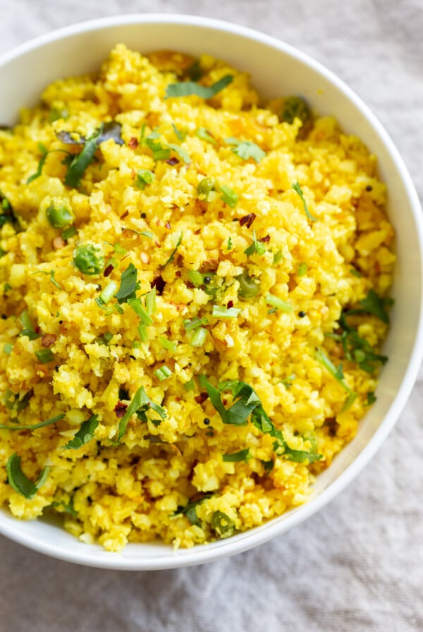 Lemony Turmeric Cauliflower Rice. Easy Side with any meal. 1 Pot Lemon Cauliflower Rice with mustard seeds and garlic. #Vegan #Glutenfree #Grainfree #Nutfree #Recipe #Turmeric #cauliflowerrice #veganrucha