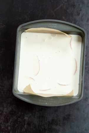 Custard layer for our Vegan Apple Custard Squares in a lined brownie pan