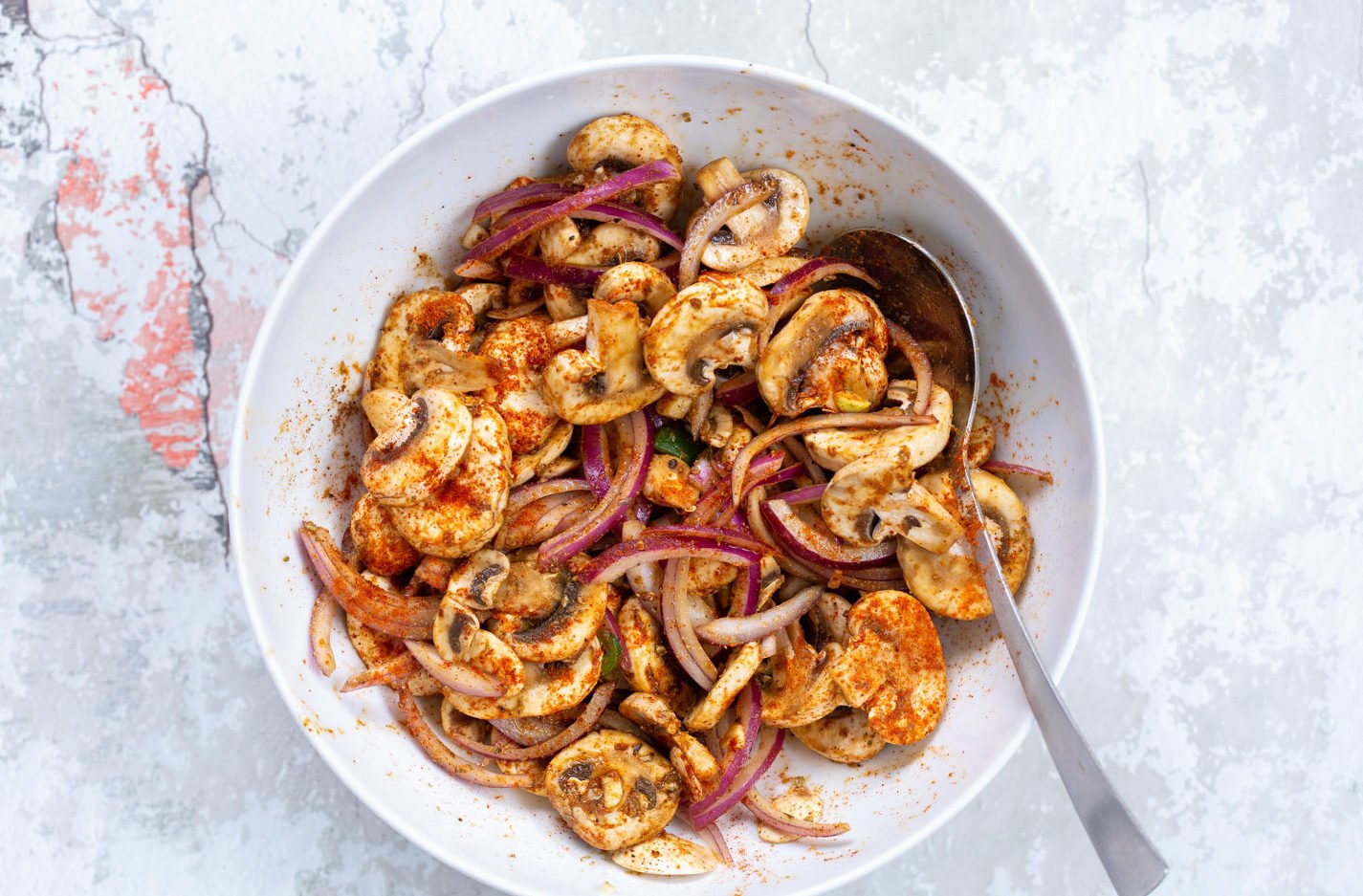 Vegan Carnitas Mushrooms and spices in white bowl