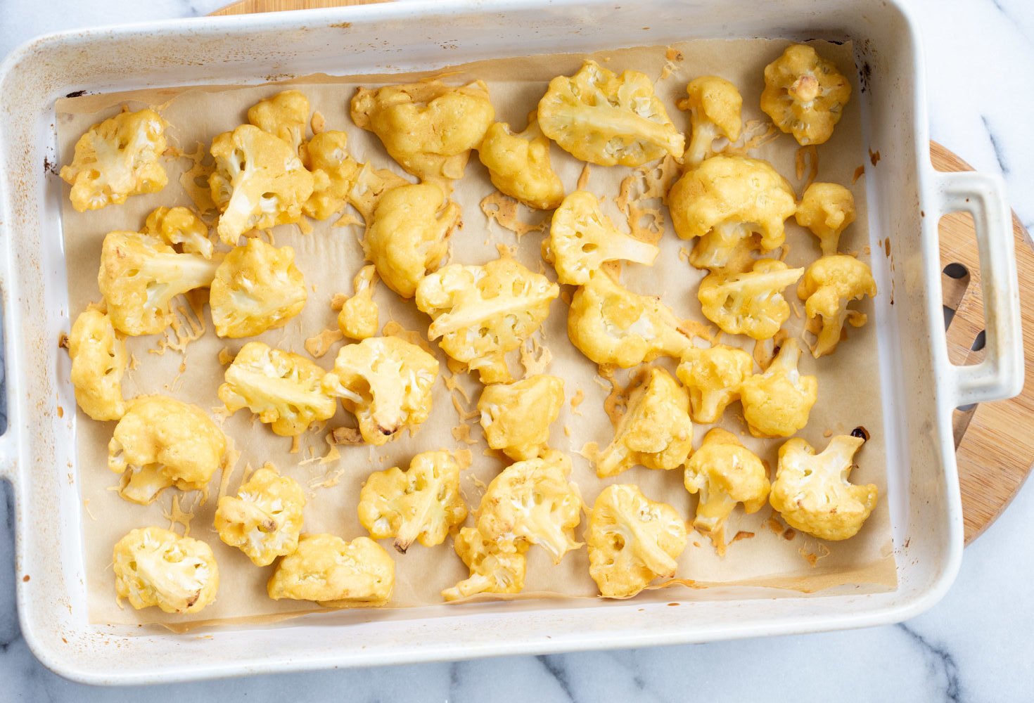 Vegan Nashville Hot Cauliflower Wings in a white baking dish