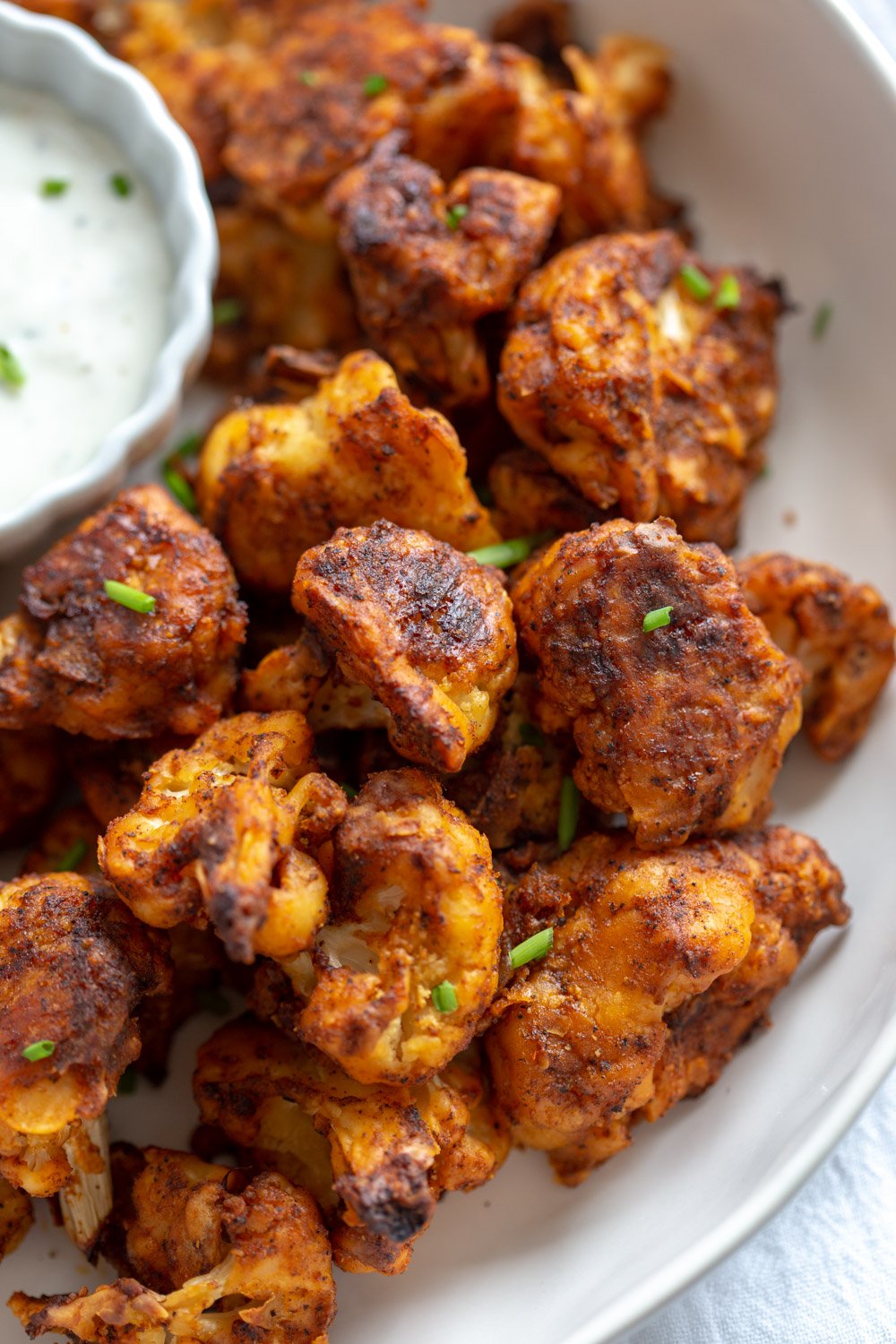 Vegan Nashville Hot Cauliflower Bites. These Nashville Style Hot Cauliflower wings are flavorful, hot and Delicious! Serve with vegan ranch or other dips. Add to wraps or bowls. #Vegan #Nutfree #Soyfree #Recipe #Glutenfreeoption #veganricha #nashvillecauliflower #veganhotcauliflower
