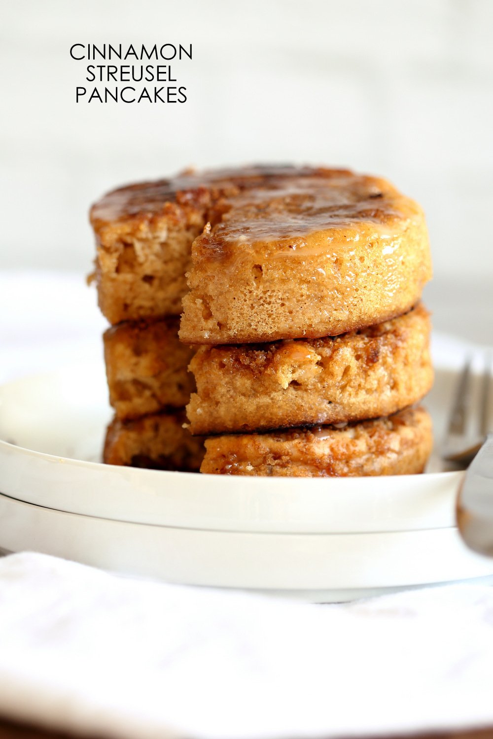 These Vegan Cinnamon Streusel Pancakes are a perfect treat for Valentines or a special day. A delicious fluffy vanilla pancake topped with a cinnamon streusel for a coffee cake like pancake. Make the pancakes in cookie cutters to make a cake like pancake tower! #Vegan #Pancakes #Soyfree #Nutfree #Recipe #VeganRicha